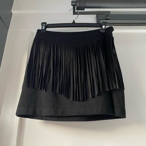 Black faux suede festival mini skirt with fringe by JACK